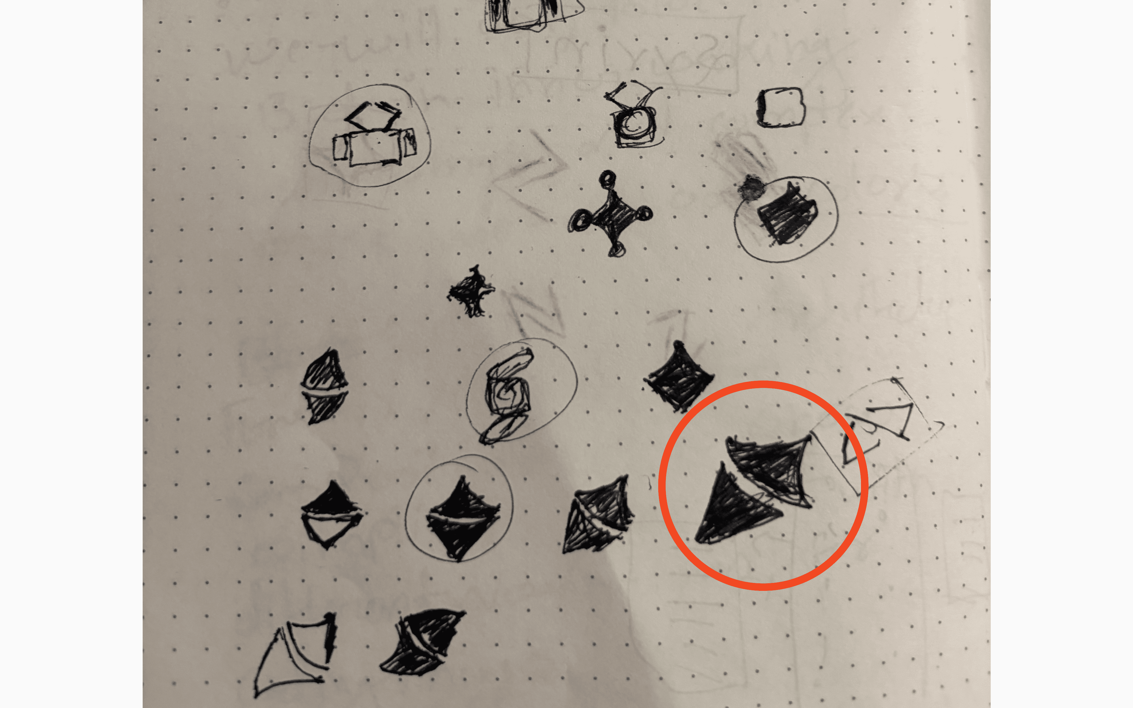 Behind-the-scenes paper sketches and the Illustrator construction grid for the Spinner mark