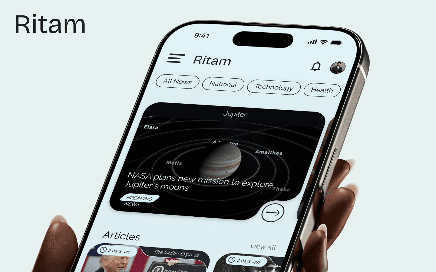 Ritam news app displayed on iPhone held in hand, showing home screen with breaking news and article cards